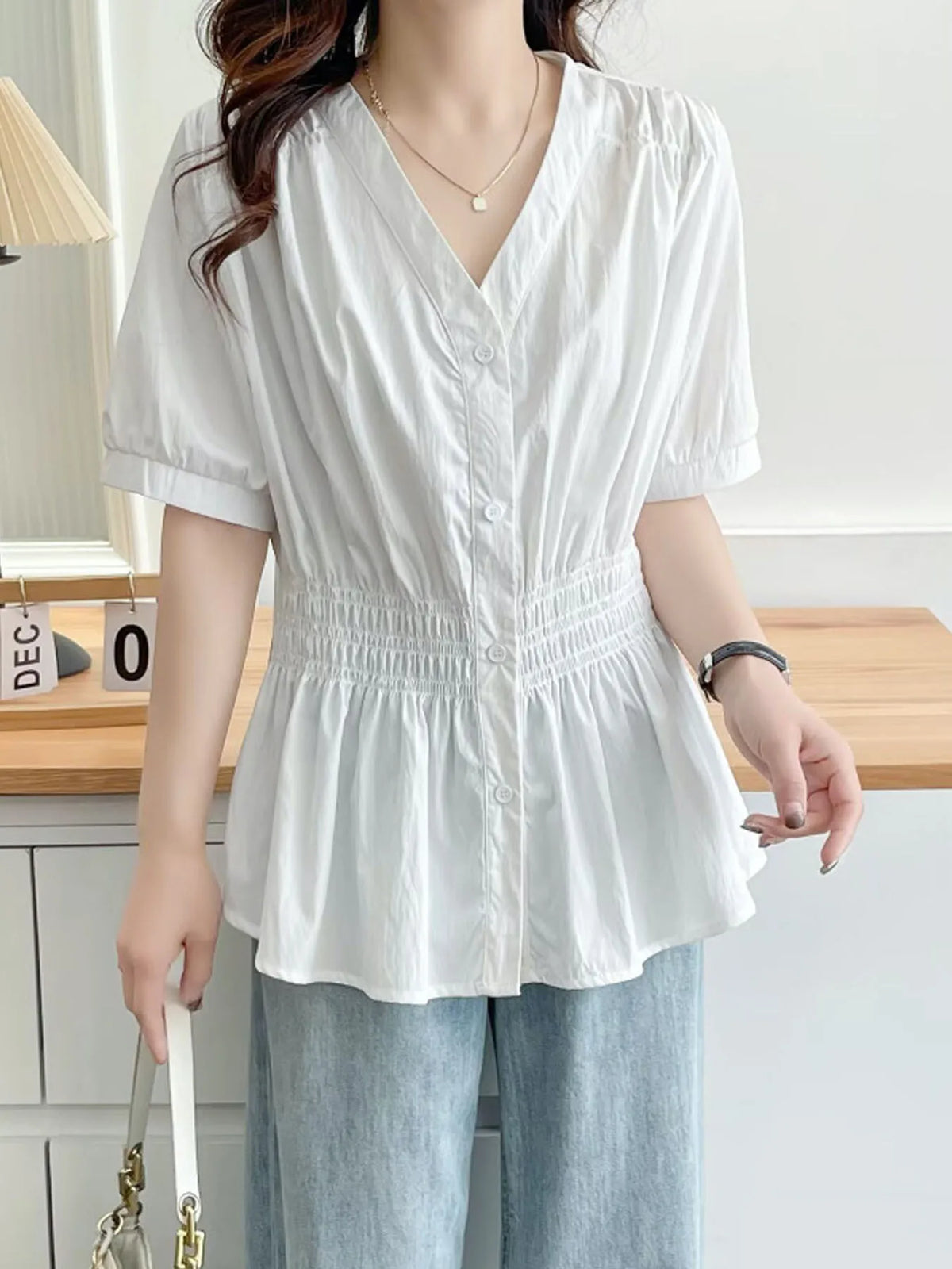 Elastic waist cinching and slimming summer shirt